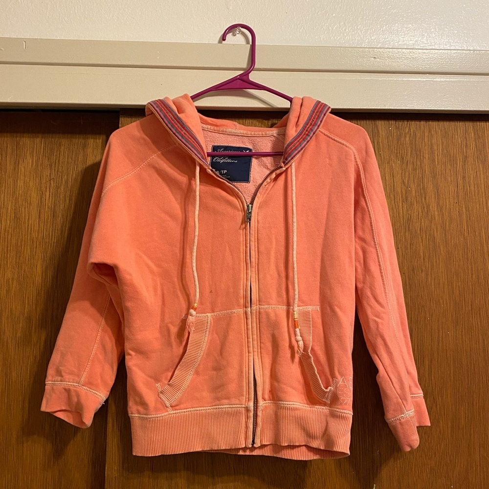 Salmon colored half jacket